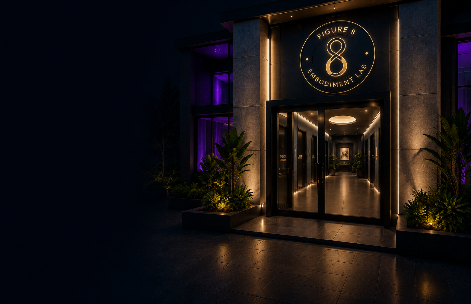 The Figure 8 Embodiment Lab entrance at night — a warm-lit doorway leading into a hallway of rooms